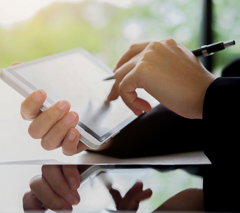 Person entering information on a tablet